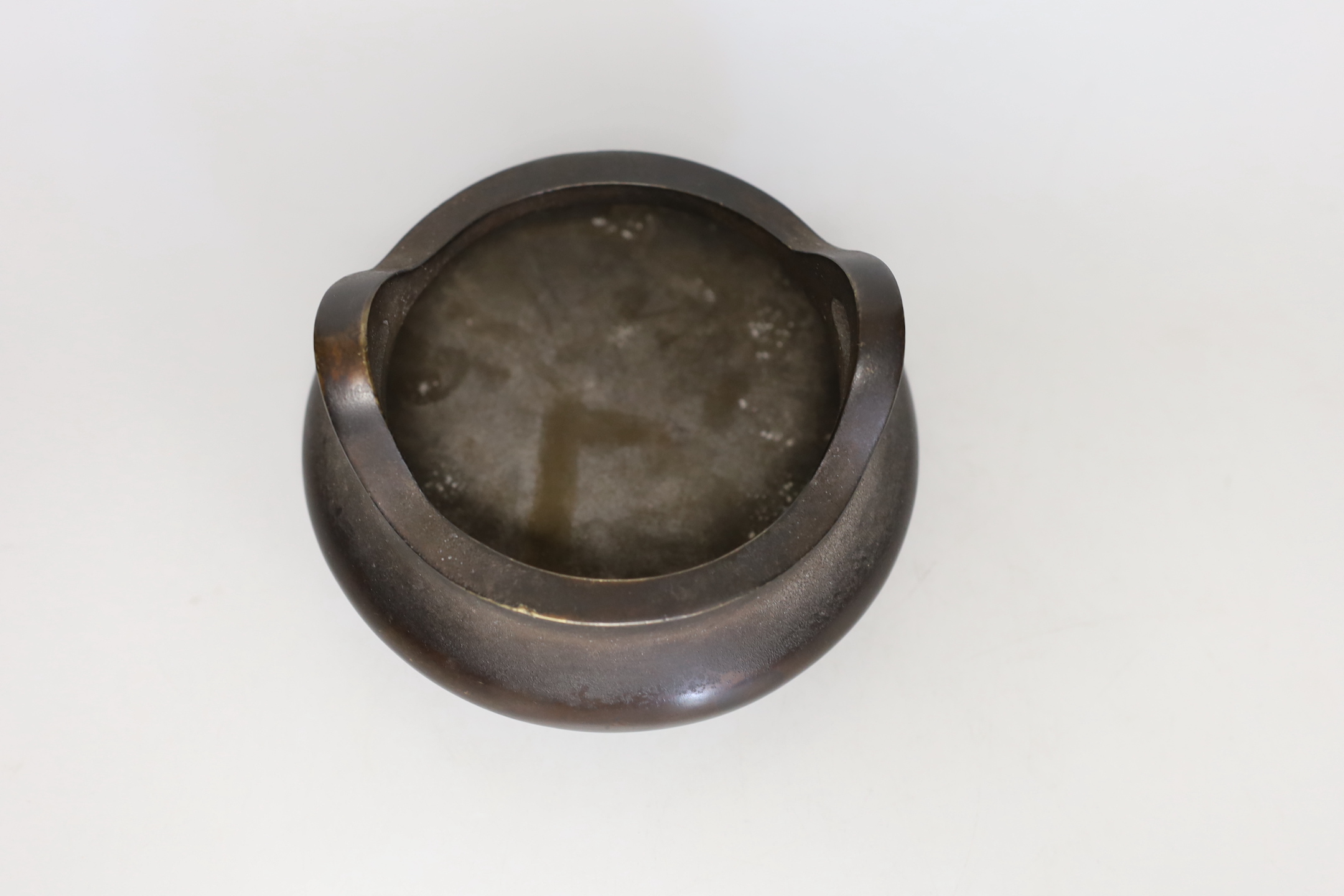 A Chinese bronze censer, ding, 8cm tall